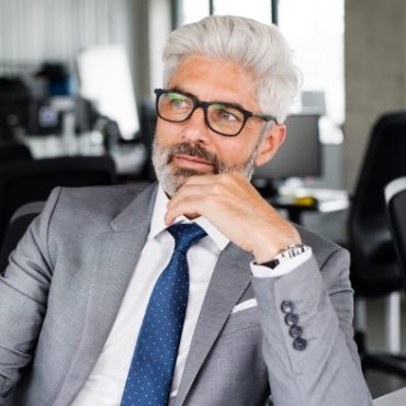 Home demo attachment 169 mature businessman in gray suit in the office psexzsv